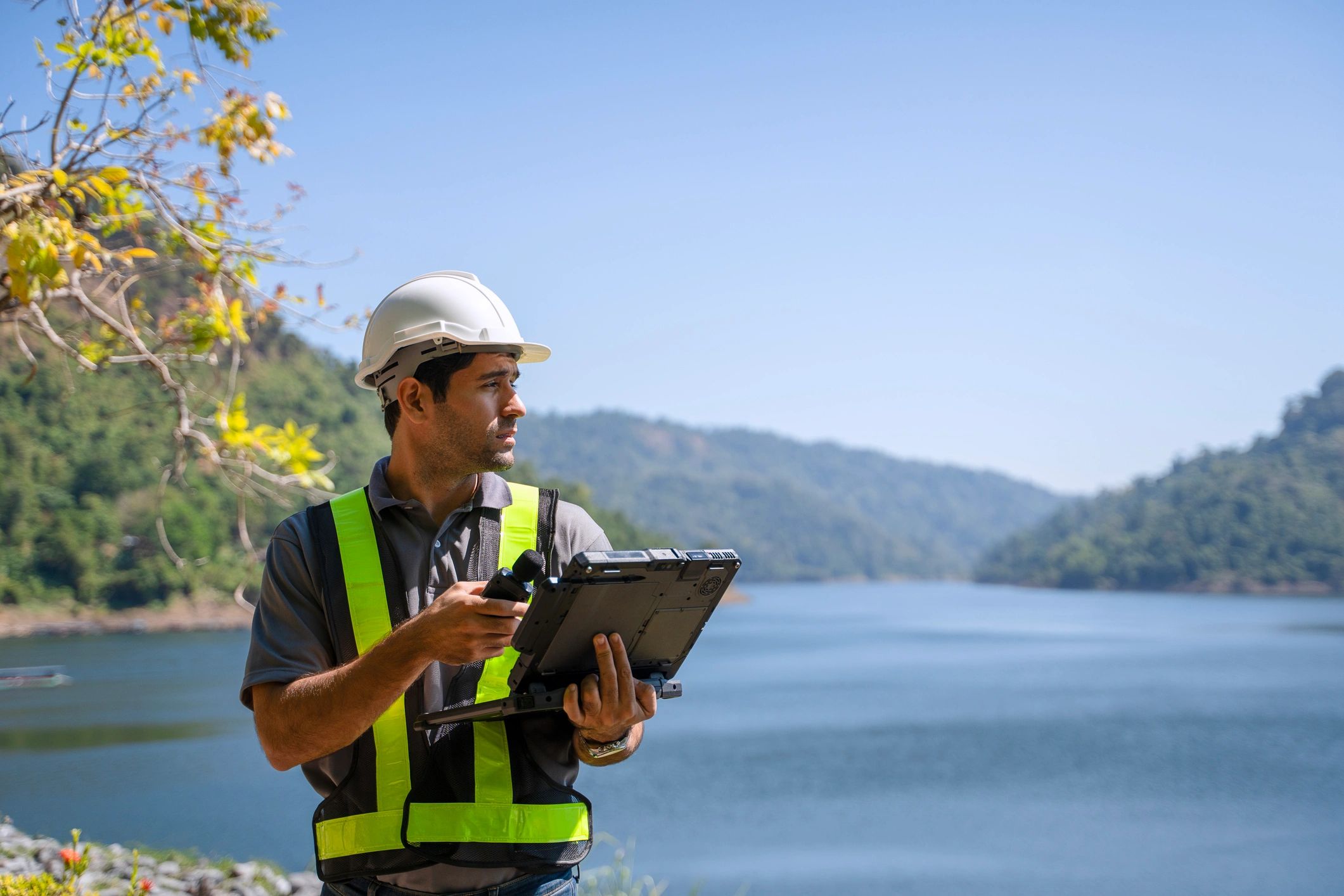 Field technician using digital tools for work